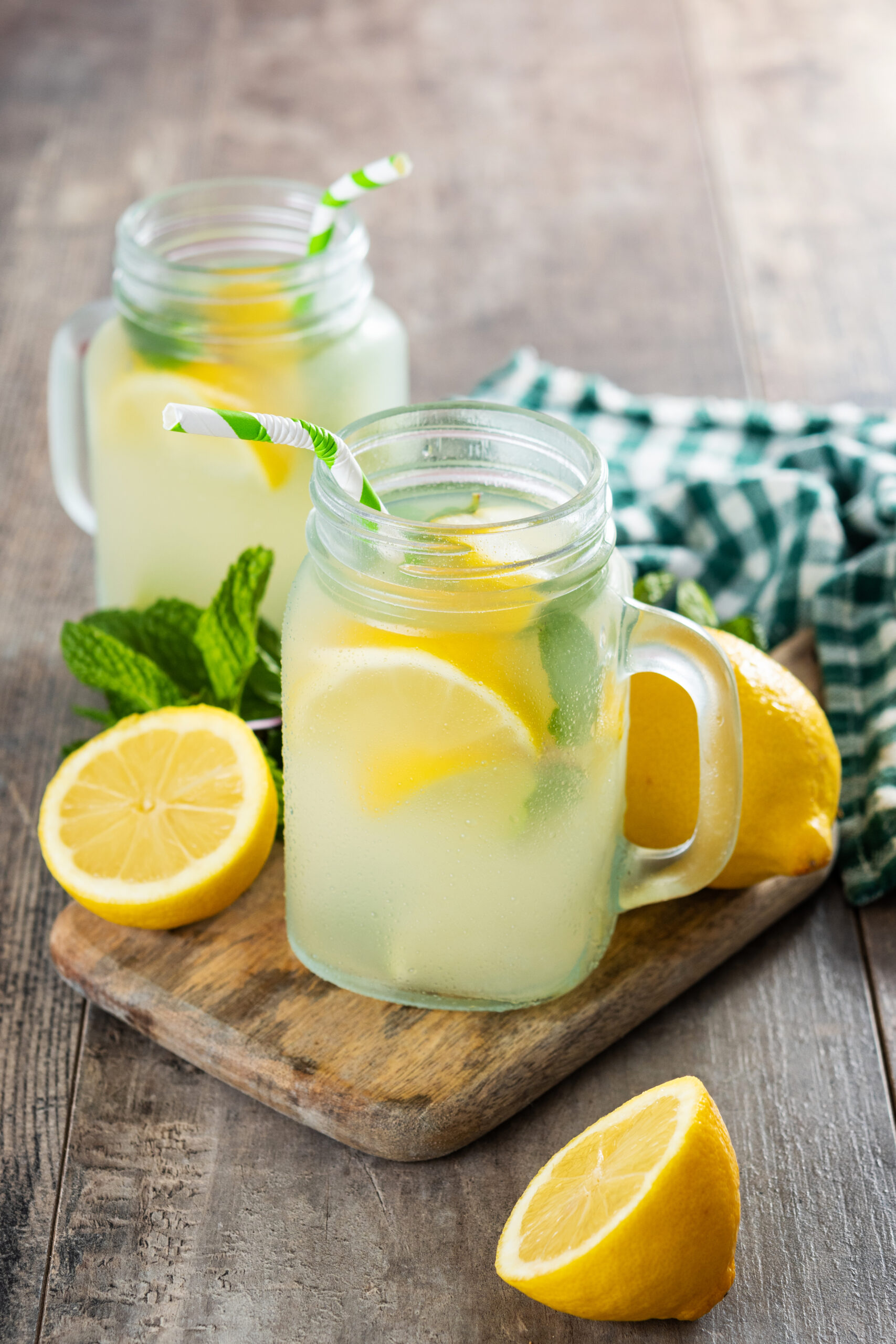 Lemonade drink in a jar glass on wooden table